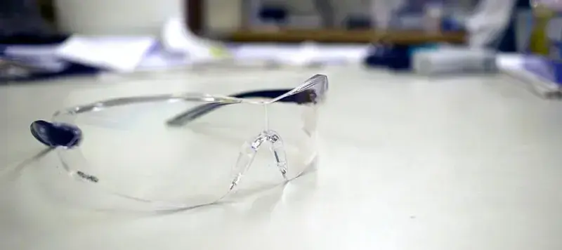 Health and Safety Goggles laying on bench